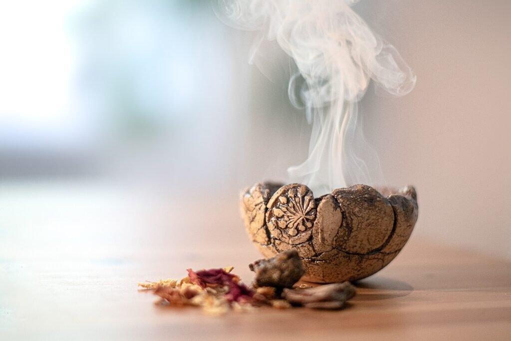 Incense bowl burning herbs